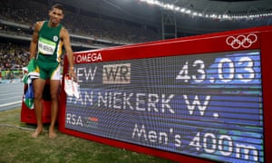 Wayde van Niekerk of South Africa celebrates after setting a new world record to win the men’s 400m.