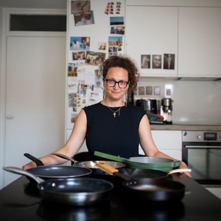 Dale Berning Sawa, at her kitchen table, getting ready to test 12 frying pans for the Guardian’s Filter website.