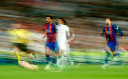 Barcelona’s midfielder Sergi Roberto leaves Marcelo in his wake.