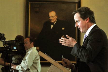 comprehensively explain political speech writing David Cameron speaking in front of a portrait of Winston Churchill