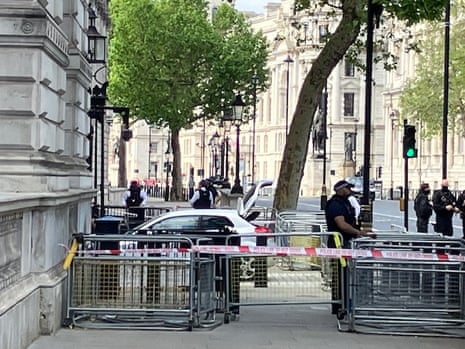 The car after it crashed into the gates of Downing Street.