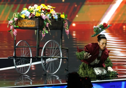 Miss Great Britain, Danielle Latimer, falls on stage during the national costume competition