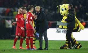 Then Bayern manager Pep Guardiola talks to Joshua Kimmich at the final whistle in Dortmund in 2016