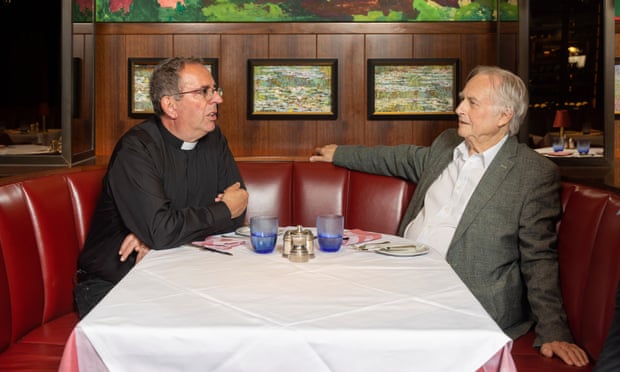 Rev Richard Coles and Richard Dawkins sitting at a table at the Colony Grill in London