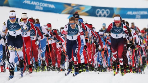 Athletes at the start of the women’s cross country 10km + 10km skiathlon in Lago di Tesero.
