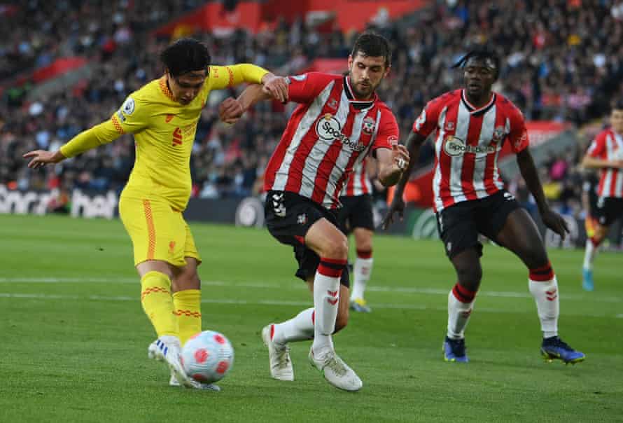 Takumi Minamino thumps in the equaliser for Liverpool.