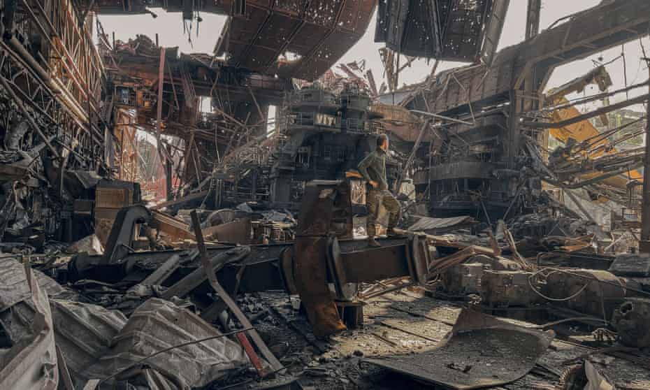 A Ukrainian soldier stands inside the ruined Azovstal steel plant in Mariupol before the surrender to Russian forces