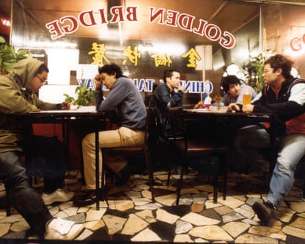 Five men sitting in a restaurant