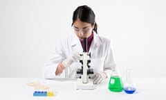 Scientist with microscope