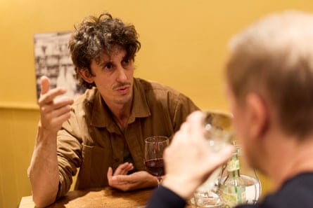 Edward and Martin chatting at a restaurant table