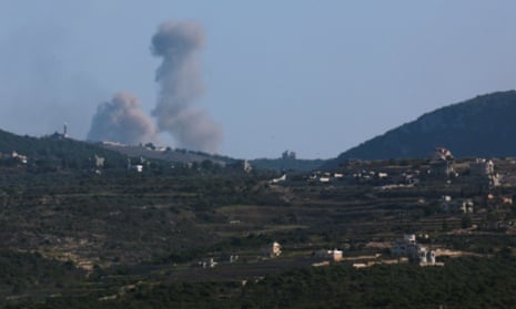 Smoke billows amid the ongoing hostilities between Hezbollah and Israeli forces, as seen from Tyre, southern Lebanon, 21 October 2024.