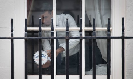 Then Chancellor Rishi Sunak placing an ‘Eat out to help out’ sticker in the window of No 11 Downing Street, 21 December 2020.