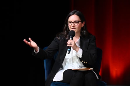 Bari Weiss seated and speaking into a microphone