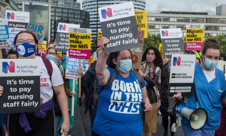 NHS workers march to Downing Street in July to demand a larger pay rise