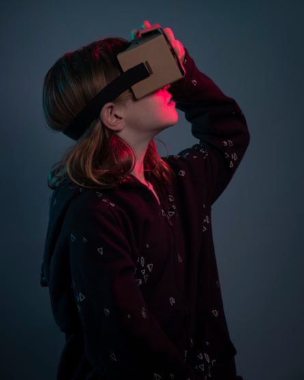 Girl using virtual reality headset.