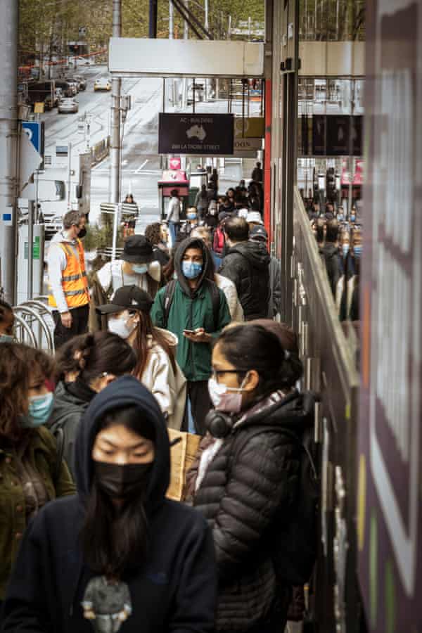 Hundreds of international students line up waiting for the Food Bank, Latrobe Street, Melbourne.