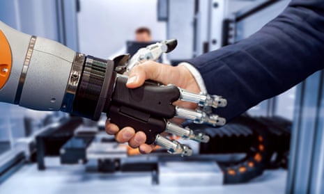 A businessman shaking hands with a robot