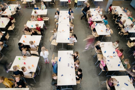 Pupils in the school cafeteria at lunchtime.