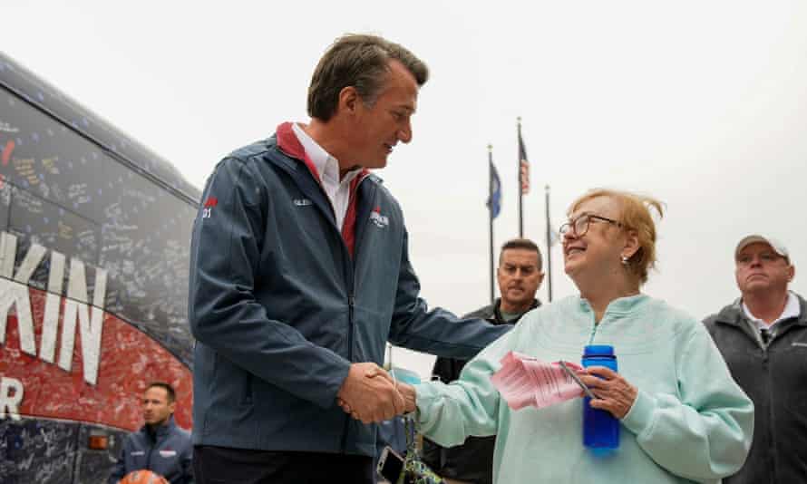 glenn youngkin greets a supporter