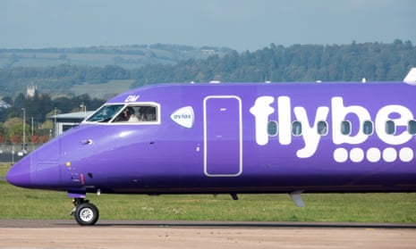 An aircraft operated by Flybe taxis down the runway at Exeter Airport.