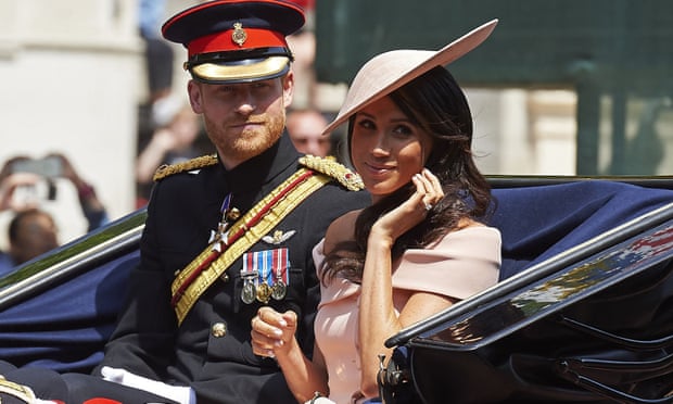 The Duke and Duchess of Sussex in a horse-drawn carriage after attending the Queen’s Birthday Parade in 2018.
