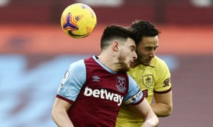 Declan Rice of West Ham United collides with Josh Brownhill of Burnley.
