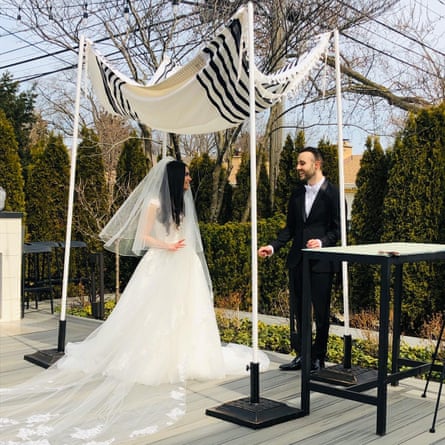 Eliana Amrami and Elliot Birn get married in her parents’ back garden in Chicago.
