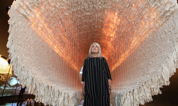 Judith Neilson looks at Jinshi Zhu's The Ship Of Time which contains myriad sheets of xuan (rice) paper, pieces of fine bamboo and cotton threads during a preview of the exhibition A Fairy Tale in Red Times: Works from the White Rabbit Collection at NGV International