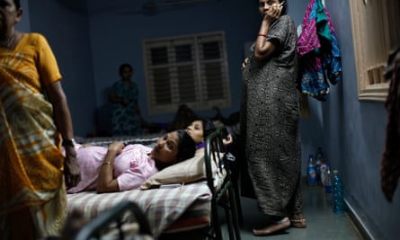 Surrogate mothers rest at a facility in Anand town
