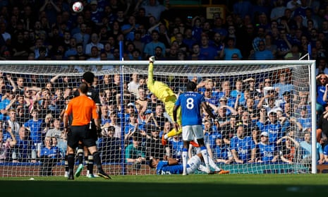 Mark Travers tips over an Everton effort on goal.