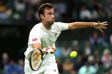 Quentin Halys of France plays a forehand against Daniel Evans of Great Britain.
