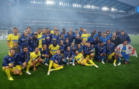 The players pose after a draw in the Game4Ukraine charity match at Stamford Bridge at Stamford Bridge on 5 August.