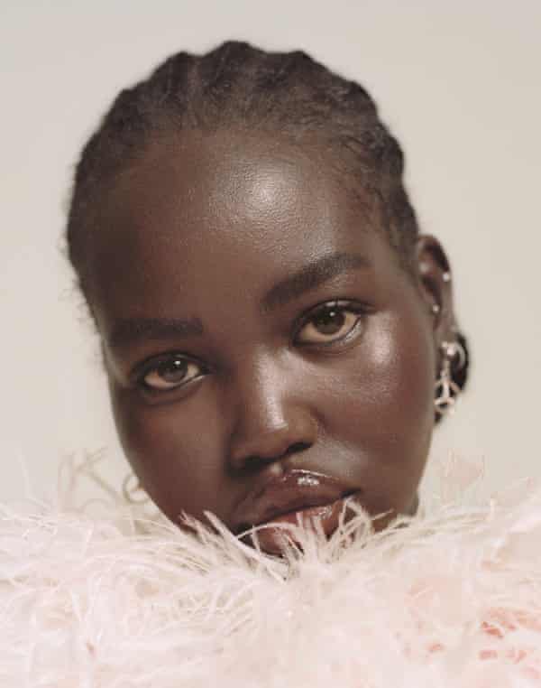 If a little dark-skinned South Sudanese refugee who comes from absolutely nothing can do it, so can you.”Feather dress by halpernstudio.com