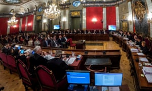 The 12 separatist leaders sit at their trial at the Spanish supreme court in Madrid