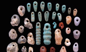 Stone pendants and earrings from the communal cemetery of Lothagam North, Kenya, built by eastern Africaâ€™s earliest herders up to 5,000 years ago.