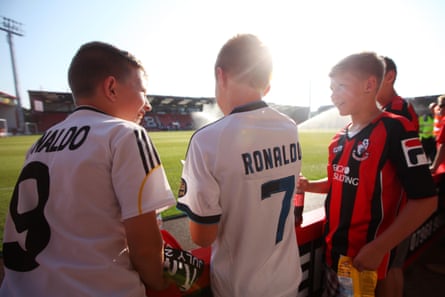 Young Bournemouth fans waiting to catch a glimpse of Real Madrid in 2013