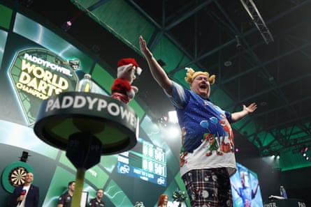 Ricky Evans with his Santa toy and shirt