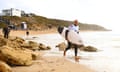 Kelly Slater of US prepares to enter the water at Bells Beach