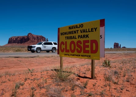 A Navajo park ranger drives outside the Monument Valley Tribal Park in Arizona.