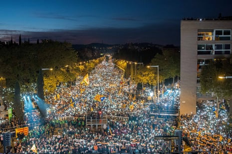 Catalonia independence supporters march at a rally in Barcelona, Spain