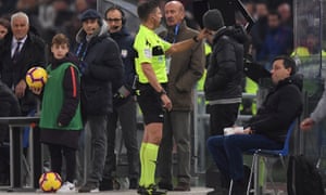 Referee Gianluca Rocchi consults VAR before awarding Roma a penalty.