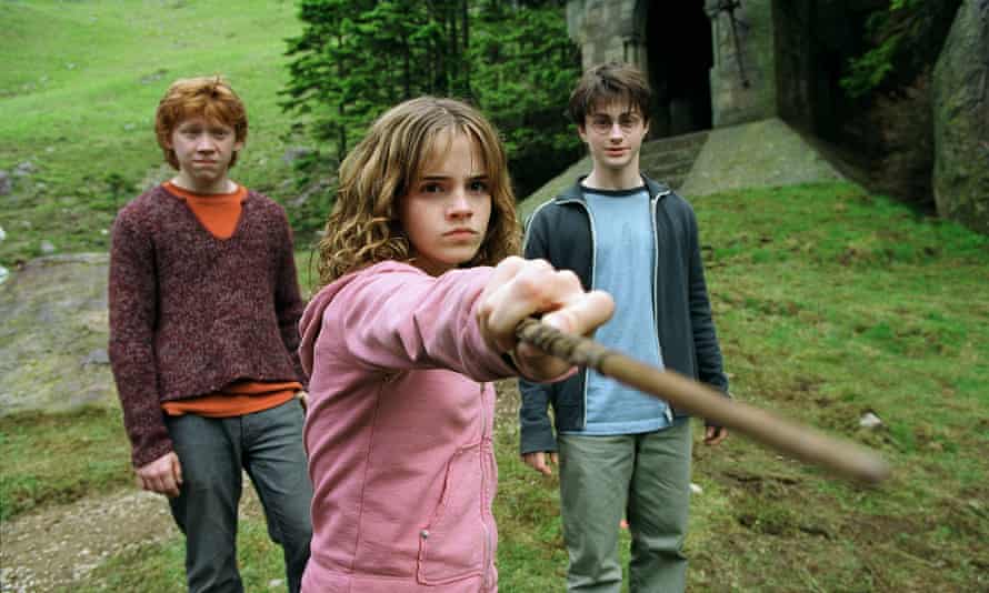 Rupert Grint, left, and Daniel Radcliffe with Emma Watson as Hermione Granger in Harry Potter and the Prisoner of Azkaban (2004).