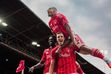 Chris Wood celebrates scoring against Brentford on the opening day.