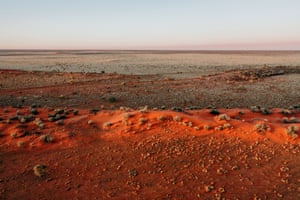 The red sand hills on the road from Windorah to Birdsville as the sun sets.