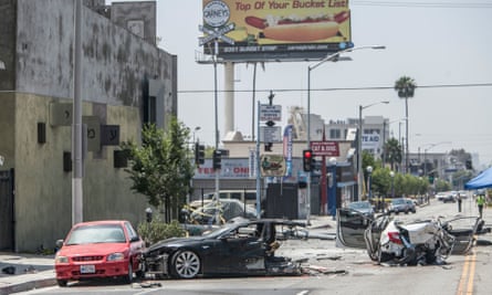 A stolen Tesla automobile wrecked on La Brea Avenue in Los Angeles after a police chase.
