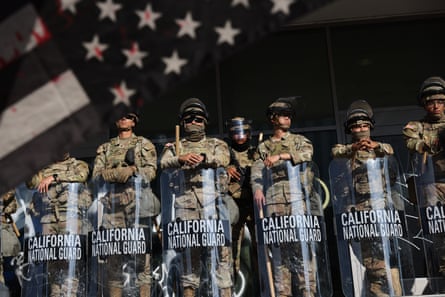 National Guard officers stand at guard