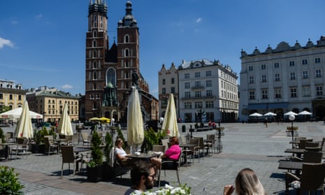 Locals in Kraków’s Unesco-listed Main Square