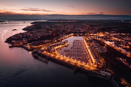 An aerial view of Milford Waterfront at dusk.