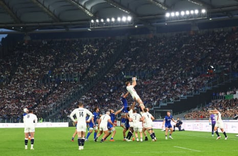 England's Alex Coles beats Italy's Michele Lamaro in the line-out.