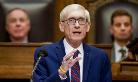 Tony Evers, the governor of Wisconsin, addresses a joist session of the state’s legislature on 15 February 2022. Behind him, on the left, s Robin Vos.